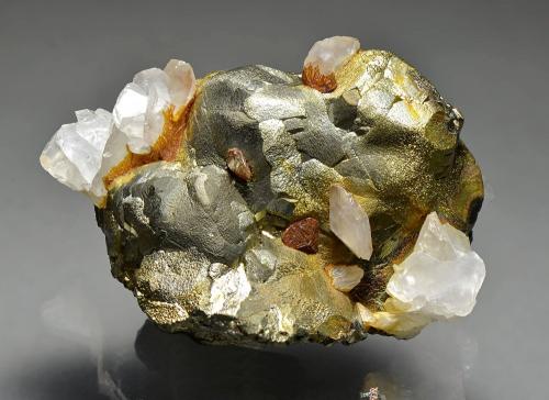 Pyrite, calcite.<br />Stan Trg (Stan Terg, Stari Trg) Mine, Trepča Complex, Trepča Valley, Kosovska Mitrovica, Kosovska Mitrovica District, Kosovo<br />7.5 x 6.5 x 6 cm.<br /> (Author: Martin Rich)