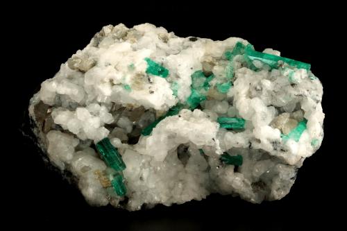 Beryl (variety emerald), Calcite<br />Muzo mining district, Western Emerald Belt, Boyacá Department, Colombia<br />130x85x100mm, xls up to 27mm<br /> (Author: Fiebre Verde)