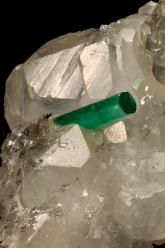 Beryl (variety emerald), Calcite<br />La Pita mining district, Polveros Mine, Municipio Maripí, Western Emerald Belt, Boyacá Department, Colombia<br />35x64x49mm, xl=12mm<br /> (Author: Fiebre Verde)