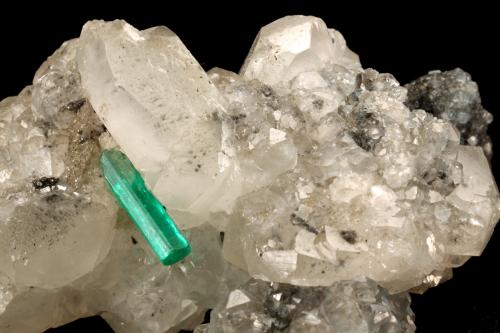 Beryl (variety emerald), Calcite<br />La Pita mining district, Polveros Mine, Municipio Maripí, Western Emerald Belt, Boyacá Department, Colombia<br />35x64x49mm, xl=12mm<br /> (Author: Fiebre Verde)