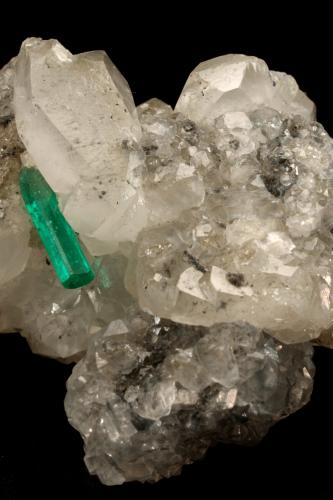 Beryl (variety emerald), Calcite<br />La Pita mining district, Polveros Mine, Municipio Maripí, Western Emerald Belt, Boyacá Department, Colombia<br />35x64x49mm, xl=12mm<br /> (Author: Fiebre Verde)