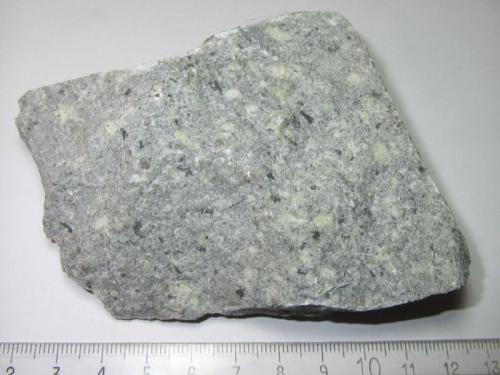 Microgranito Threlkeld
Threlkeld Quarry, Threlkeld, Threlkeld District, North and Western Region, Cumbria, Inglaterra, Reino Unido
9 x 7’5 cm. (Autor: prcantos)