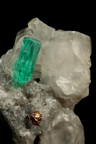 Beryl (variety emerald), Calcite, Pyrite<br />La Pita mining district, Cunas Mine, Municipio Maripí, Western Emerald Belt, Boyacá Department, Colombia<br />26x17x30mm, xl=9x2mm<br /> (Author: Fiebre Verde)