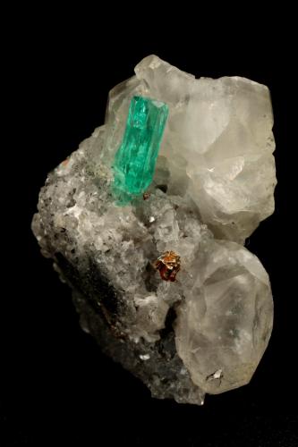 Beryl (variety emerald), Calcite, Pyrite<br />La Pita mining district, Cunas Mine, Municipio Maripí, Western Emerald Belt, Boyacá Department, Colombia<br />26x17x30mm, xl=9x2mm<br /> (Author: Fiebre Verde)