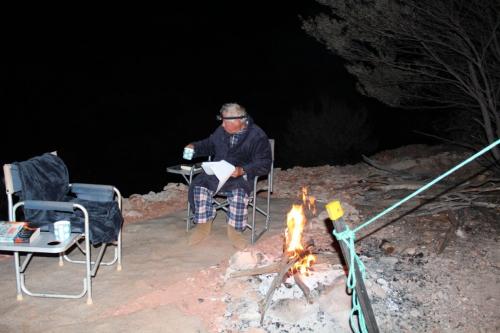 Photo 6. Rough Old Miner hugging the camp fire in winter night outfit complete with mine ugg boots.  You can see why we get so few visitors. (Author: crocoite)