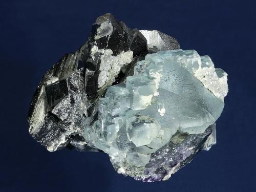 Ferberite with Fluorite<br />Yaogangxian Mine, Yizhang, Chenzhou Prefecture, Hunan Province, China<br />84 x 75 x 55 mm<br /> (Author: GneissWare)