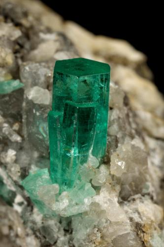 Beryl (variety emerald), Calcite<br />Coscuez mining district, Municipio San Pablo de Borbur, Western Emerald Belt, Boyacá Department, Colombia<br />30x49x29mm, xl=9x4mm<br /> (Author: Fiebre Verde)