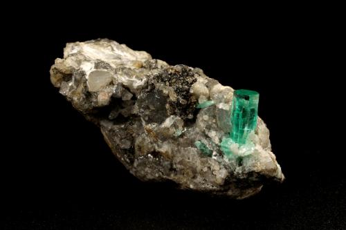 Beryl (variety emerald), Calcite<br />Coscuez mining district, Municipio San Pablo de Borbur, Western Emerald Belt, Boyacá Department, Colombia<br />30x49x29mm, xl=9x4mm<br /> (Author: Fiebre Verde)