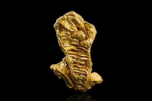 Gold<br />Alta Floresta District, Provincia Juruena-Teles Pires mineral, Mato Grosso, Brasil<br />3.5 x 1.5 x 5.5 cm<br /> (Author: MIM Museum)