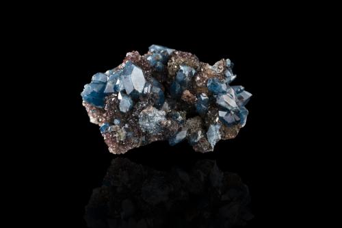 Scorodite<br />Noche Buena Mine, Noche Buena, Municipio Mazapil, Zacatecas, Mexico<br />5.5 x 4.0 x 5.0 cm<br /> (Author: MIM Museum)