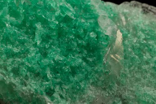 Beryl (variety emerald), Calcite<br />La Pita mining district, Municipio Maripí, Western Emerald Belt, Boyacá Department, Colombia<br />47x24x34mm<br /> (Author: Fiebre Verde)