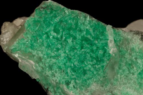 Beryl (variety emerald), Calcite<br />La Pita mining district, Municipio Maripí, Western Emerald Belt, Boyacá Department, Colombia<br />47x24x34mm<br /> (Author: Fiebre Verde)