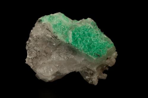 Beryl (variety emerald), Calcite<br />La Pita mining district, Municipio Maripí, Western Emerald Belt, Boyacá Department, Colombia<br />47x24x34mm<br /> (Author: Fiebre Verde)