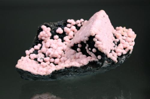 Rhodochrosite, Goethite<br />Distrito Santa Eulalia, Municipio Aquiles Serdán, Chihuahua, México<br />11.0 x 5.3 x 5.0 cm<br /> (Author: Don Lum)