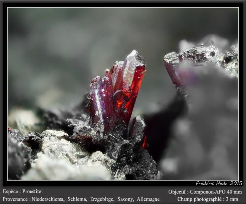 Proustite<br />Niederschlema, Bad Schlema (Schlema), Schlema-Hartenstein District, Erzgebirgskreis, Saxony/Sachsen, Germany<br />fov 3 mm<br /> (Author: ploum)