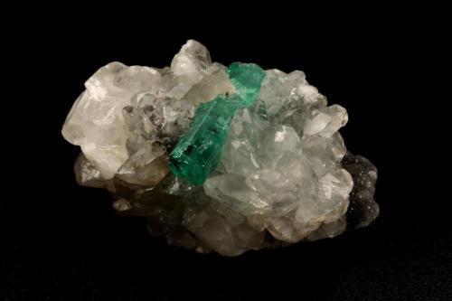 Beryl (variety emerald), Calcite<br />La Pita mining district, Cunas Mine, Municipio Maripí, Western Emerald Belt, Boyacá Department, Colombia<br />31x21x20mm, xl=16x4mm<br /> (Author: Fiebre Verde)