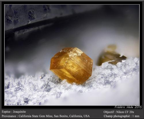 Joaquinite<br />California State Gem Mine (Benitoite Gem Mine), San Benito River headwaters area, Santa Rita Peak, New Idria District, San Benito County, California, USA<br />fov 1 mm<br /> (Author: ploum)