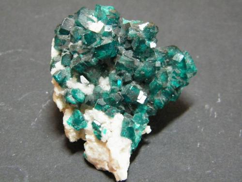 Dioptase<br />Tsumeb Mine, Tsumeb, Otjikoto Region, Namibia<br />40x50x35mm<br /> (Author: Heimo Hellwig)