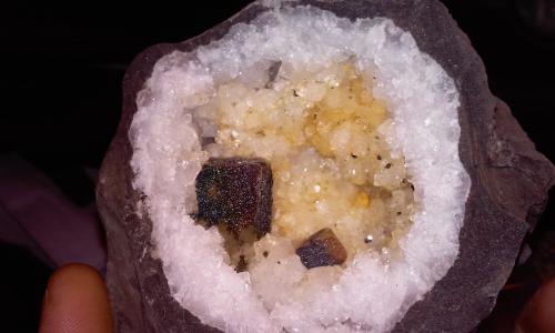 Goethite, Calcite, Quartz<br />State Route 1 road cut, Woodbury, Cannon County, Tennessee, USA<br />12 x 15 mm. the cube<br /> (Author: jordanlowe1089)