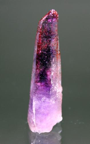 Quartz (variety amethyst) with inclusions of Goethite<br />Brandberg area, Erongo Region, Namibia<br />6.7 x 2.5 cm<br /> (Author: Don Lum)