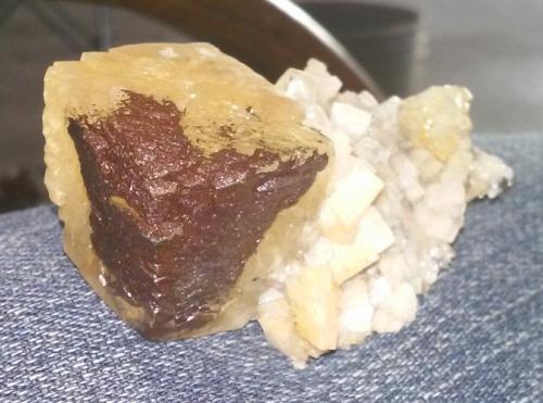 Dolomite, Calcite and iron oxides<br />State Route 1 road cut, Woodbury, Cannon County, Tennessee, USA<br />2 1/2x 1 1/2in.<br /> (Author: jordanlowe1089)