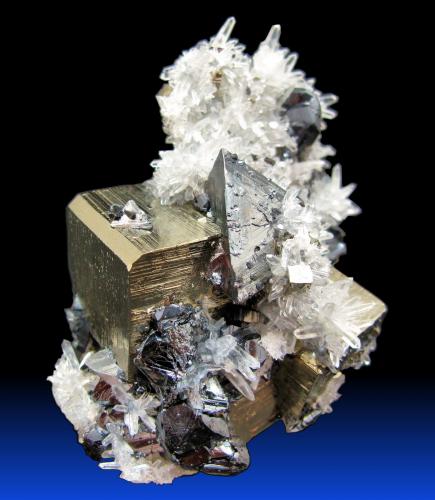 Tetrahedrite, Pyrite, Quartz, Sphalerite<br />Mundo Nuevo mining area, Mundo Nuevo, Huamachuco, Sánchez Carrión Province, La Libertad Department, Peru<br />77 mm x 71 mm x 54 mm. Tetrahedrite crystal: 24 mm on edge. Major pyrite crystal: 26 mm on edge<br /> (Author: Carles Millan)
