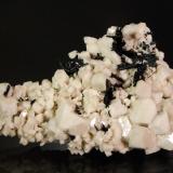 Aegirine on Orthoclase<br />Mount Malosa, Zomba District, Malawi<br />10.7 x 7.2 x 2.4 cm<br /> (Author: Michael Shaw)