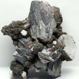 Arsenopirita y Calcita<br />Minas da Panasqueira, Aldeia de São Francisco de Assis, Covilhã, Castelo Branco, Cova da Beira, Centro, Portugal<br />50 x 52 x 30 mm.<br /> (Autor: José Luis Zamora)