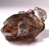 Topaz, Quartz (variety smoky quartz)Kleine Spitzkoppe, Spitzkopje area, Karibib District, Erongo Region, Namibia42 mm x 39 mm x 29 mm (Author: Don Lum)