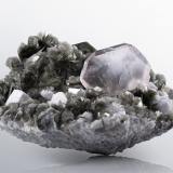 Fluorite on Mica (Group) and with Orthoclase<br />Chumar Bakhoor, Hunza Valley, Nagar District, Gilgit-Baltistan (Northern Areas), Pakistan<br />26 x 22 x 13.5 cm / main crystal: 9.0 cm.<br /> (Author: MIM Museum)