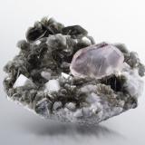 Fluorite on Mica (Group) and with Orthoclase<br />Chumar Bakhoor, Hunza Valley, Nagar District, Gilgit-Baltistan (Northern Areas), Pakistan<br />26 x 22 x 13.5 cm / main crystal: 9.0 cm.<br /> (Author: MIM Museum)