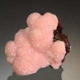 Rhodochrosite<br />Potosí Mine, Santo Domingo (Francisco Portillo), Santa Eulalia District, Municipio Aquiles Serdán, Chihuahua, Mexico<br />2.7 x 2.5 x 1.5 cm<br /> (Author: Michael Shaw)