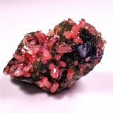 Rhodochrosite, GoethiteMina Potosí, nivel 10, Santo Domingo (Francisco Portillo), Distrito Santa Eulalia, Municipio Aquiles Serdán, Chihuahua, México35 mm x 25 mm x 20 mm (Author: Don Lum)