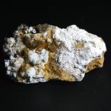 Hemimorfita en Hidrozincita<br />Mina La Cuerre, zona minera de La Florida, Rionansa-Herrerías, Comarca Saja-Nansa, Cantabria, España<br />5 x 3 cm.<br /> (Autor: Antonio P. López)