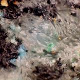 HEMIMORFITA<br />Mina Zapateros, Arroyo de Zapateros, Venta de Matagatos, Majar Nevado y Lagar, Málaga, Comarca Málaga-Costa del Sol, Andalucía, España<br />< 1 mm<br /> (Autor: José Luis Zamora)