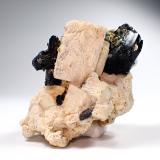 Feldspar (variety Carlsbad Twin), Beryl (variety alkali beryl), Schorl, Hyalite Opal<br />Erongo Mountain, Usakos, Erongo Region, Namibia<br />75 mm x 62 mm x 54 mm<br /> (Author: Don Lum)