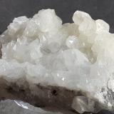Calcite, Quartz<br />Baimashan tunnel (construction site), Qianbaxia, Wuyishan, Nanping Prefecture, Fujian Province, China<br />4 x 2,5 cm<br /> (Author: Volkmar Stingl)