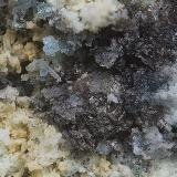 Poitevinita y romeritaMina Esperanza (antigua Mina del Oro), Cala del Mal Paso, Cuevas del Almanzora, Comarca Levante Almeriense, Almería, Andalucía, EspañaCampo de visión de 5 mm. (Autor: Antonio Carmona)