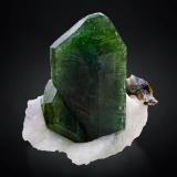 Diopside on Calcite with Phlogopite<br />Pitwak Mine, Ladjuar Medam, Sar-e Sang, Koksha Valley, Khash & Kuran Wa Munjan Districts, Badakhshan Province, Afghanistan<br />7 x 5 x 6.5 cm / main crystal: 6.0 cm.<br /> (Author: MIM Museum)
