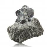 Chrysoberyl (variety alexandrite)<br />Krupskoye deposit, Izumrudnye Kopi area, Malyshevo, Sverdlovsk Oblast, Ural, Russia<br />10.5 x 5 x 10 cm / main crystal: 7 cm.<br /> (Author: MIM Museum)