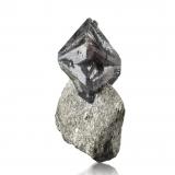 Chrysoberyl (variety alexandrite)<br />Krupskoye deposit, Izumrudnye Kopi area, Malyshevo, Sverdlovsk Oblast, Ural, Russia<br />10.5 x 5 x 10 cm / main crystal: 7 cm.<br /> (Author: MIM Museum)