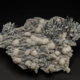 Stibnite, CalciteHerja Mine, Chiuzbaia, Baia Sprie, Maramures, Romania11.0 x 7.5 cm (Author: am mizunaka)