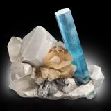 Beryl (variety aquamarine) with Topaz, Quartz, Orthoclase, Schorl, Arsenopyrite and RhodochrositeBiangsapi Gon prospect, Nyet Bruk, Shigar District, Gilgit-Baltistan (Northern Areas), Pakistan40 x 25 x 30 cm / main crystal: 36.6 cm. (Author: MIM Museum)
