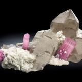 Elbaite with Quartz (variety smoky) Albite and 'lepidolite'<br />Paprok, Kamdesh District, Nuristan Province, Afghanistan<br />25 x 14 x 7.5 cm / main crystal: 5.8 cm.<br /> (Author: MIM Museum)