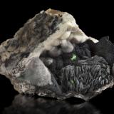 Crednerite and Malachite<br />Torr Works Quarry (Merehead Quarry), Cranmore, District Mendip, Somerset, South West England, England / United Kingdom<br />4.5 x 5 x 3.5 cm / main crystal: 0.5 cm<br /> (Author: MIM Museum)