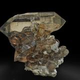 Quartz (variety smoky quartz)<br />Triolet Glacier, Ferret Valley, Les Grandes Jorasses Massif, Courmayeur, Aosta Valley (Val d'Aosta), Italy<br />10.1 x 9.3 x 5.2 cm<br /> (Author: am mizunaka)