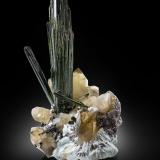 Elbaite (variety verdelite) on Quartz (variety smoky) and with Albite and 'lepidolite'<br />Cruzeiro Mine, Santa Maria do Suaçui, Governador Valadares, Vale do Rio Doce, Minas Gerais, Brazil<br />56 x 37 x 45 cm / main crystal: 49 cm<br /> (Author: MIM Museum)