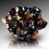 Cassiterite with Quartz<br />Viloco Mine, San Antonio Section, Loayza Province, La Paz Department, Bolivia<br />11 x 8.5 x 4 cm / main crystal: 3 cm<br /> (Author: MIM Museum)