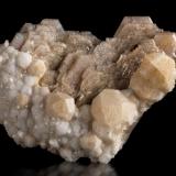 Catapleiite with Analcime<br />Poudrette Quarry, Mont Saint-Hilaire, La Vallée-du-Richelieu RCM, Montérégie, Québec, Canada<br />9.5 x 3 x 6.5 cm / main crystal: 2.1 cm<br /> (Author: MIM Museum)
