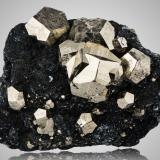 Pyrite with Hematite<br />Rio Mine (Rio Marina Mine), Valle Giove stope, Rio Marina, Elba Island, Livorno Province, Tuscany, Italy<br />25 x 13 x 17.5 cm / main crystal: 7.5 cm<br /> (Author: MIM Museum)